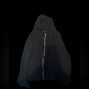 Thin black size large jacket. ( Fits more like a medium)